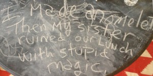 Omelet Haiku on chalkboard table