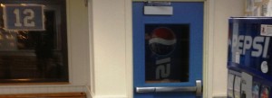 Seahawks' "12" -- Pepsi support in the door window's reflection - closeup