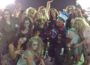Zombies from Thriller surround the cool birthday hat at the RSL soccer game, Oct, 2014