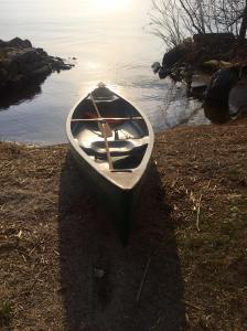 Canoe waiting at the boathouse, Lake Winneconne, Wisconsin, sunset